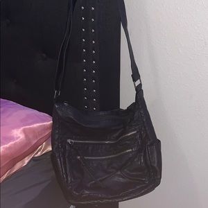 Side black leather bag